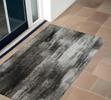 2' X 3' Gray and Black Abstract Washable Non Skid Indoor Outdoor Area Rug