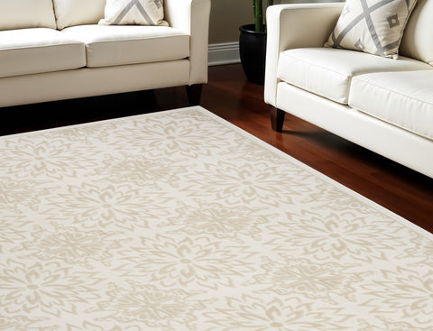 7' X 10' Beige and Ivory Floral Non Skid Area Rug