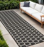 8' Black And Ivory Geometric Indoor Outdoor Runner Rug