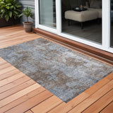 2' X 3' Mocha and Blue Abstract Washable Non Skid Indoor Outdoor Area Rug