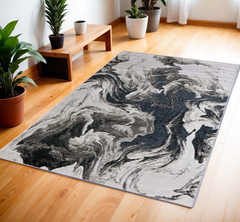 4' X 6' Ivory Black and Taupe Abstract Power Loom Area Rug
