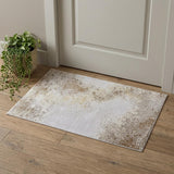 2' X 3' Tan and Ivory Abstract Power Loom Worn Faded Area Rug