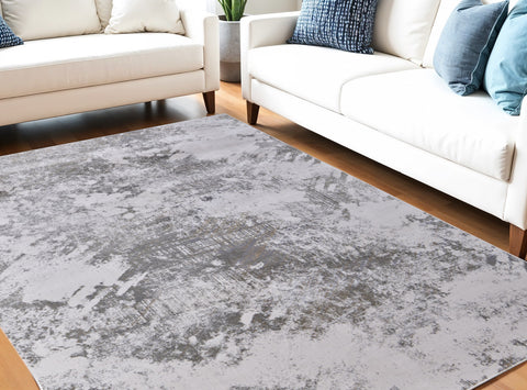 5' X 8' Gray and Silver Abstract Power Loom Worn Faded Area Rug