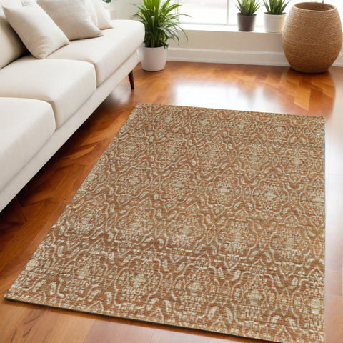 5' X 8' Orange and Tan Geometric Hand Woven Area Rug