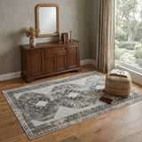 4' X 6' Gray and Ivory Abstract Power Loom Worn Faded Area Rug