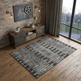 4' X 6' Gray and Black Geometric Power Loom Worn Faded Area Rug