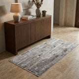 3' X 5' Gray Ivory and Gold Abstract Power Loom Area Rug With Fringe