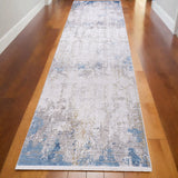 10' Ivory Gray and Blue Abstract Power Loom Runner Rug With Fringe