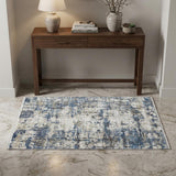 3' X 5' Ivory Tan and Blue Abstract Power Loom Area Rug With Fringe