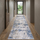 10' Ivory Tan and Blue Abstract Power Loom Runner Rug With Fringe