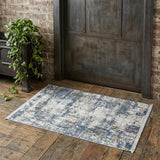 2' X 3' Ivory Tan and Blue Abstract Power Loom Area Rug With Fringe