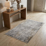 3' X 5' Ivory Taupe and Gray Abstract Power Loom Distressed Area Rug With Fringe