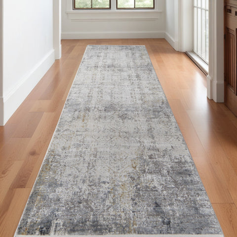 10' Ivory Taupe and Gray Abstract Power Loom Distressed Runner Rug With Fringe