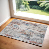 2' X 3' Gray Blue and Red Abstract Power Loom Area Rug With Fringe