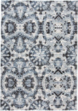 5' X 8' Blue Black and Ivory Ikat Power Loom Area Rug