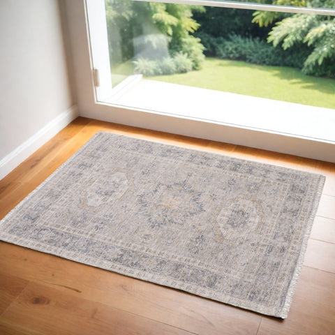2' X 3' Tan and Gray Oriental Hand Woven Distressed Area Rug With Fringe