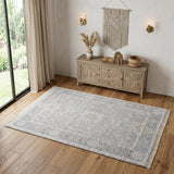 4' X 6' Gray Blue and Taupe Abstract Hand Woven Distressed Area Rug With Fringe