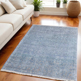 5' X 8' Blue and Gray Abstract Hand Woven Distressed Area Rug With Fringe