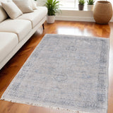 5' X 8' Gray Blue and Taupe Abstract Hand Woven Distressed Area Rug With Fringe
