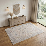 4' X 6' Ivory Tan and Blue Floral Hand Woven Distressed Area Rug With Fringe