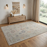 4' X 6' Tan Brown and Blue Floral Hand Woven Distressed Area Rug With Fringe