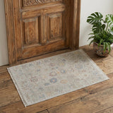 2' X 3' Tan Brown and Blue Floral Hand Woven Distressed Area Rug With Fringe