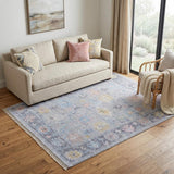 5' X 8' Orange Blue and Gold Floral Hand Woven Distressed Area Rug With Fringe