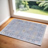 2' X 3' Orange Blue and Gold Floral Hand Woven Distressed Area Rug With Fringe