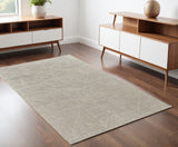 4' X 6' Tan and Ivory Wool Hand Knotted Area Rug