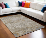 5' X 8' Ivory Gray and Brown Abstract Power Loom Worn Faded Area Rug
