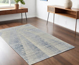 4' X 6' Ivory Blue And Silver Abstract Hand Knotted Distressed Area Rug