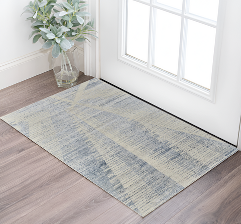 2' X 3' Ivory Blue And Silver Abstract Hand Knotted Distressed Area Rug