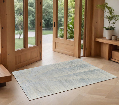 3' X 5' Blue Ivory And Silver Abstract Hand Knotted Distressed Area Rug