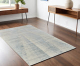 4' X 6' Blue Ivory And Silver Abstract Hand Knotted Distressed Area Rug