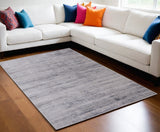 5' X 8' Gray Ivory And Taupe Area Rug