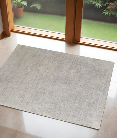 3' X 5' Gray And Ivory Abstract Hand Woven Distressed Area Rug
