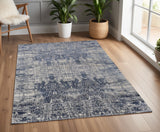 4' X 6' Blue and Ivory Abstract Hand Woven Worn Faded Area Rug