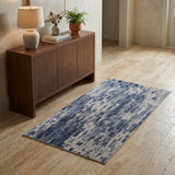 3' X 5' Blue And Ivory Abstract Hand Woven Distressed Area Rug
