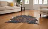 8' X 10' Brown and Silver Cowhide Animal Print Power Loom Area Rug