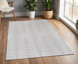 4' X 6' Ivory And Tan Geometric Hand Woven Area Rug