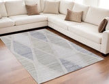 5' X 8' Ivory and Blue Geometric Hand Woven Area Rug