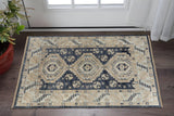 2' X 3' Blue and Ivory Wool Geometric Hand Knotted Area Rug With Fringe