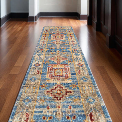 12' Blue Red and Yellow Wool Geometric Hand Knotted Runner Rug With Fringe