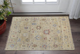 2' X 3' Tan Brown and Blue Wool Floral Hand Knotted Area Rug With Fringe