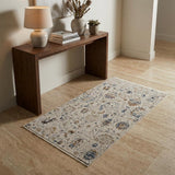3' X 5' Ivory Blue And Burnt Orange Floral Distressed Area Rug With Fringe
