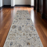 10' Blue Gray and Brown Floral Power Loom Worn Faded Runner Rug With Fringe