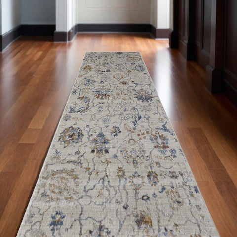 10' Blue Gray and Brown Floral Power Loom Worn Faded Runner Rug With Fringe