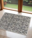 3' X 5' Ivory and Gray Abstract Power Loom Worn Faded Area Rug With Fringe