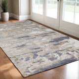 3' X 5' Tan Ivory And Blue Abstract Distressed Area Rug