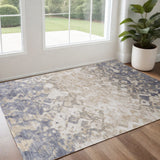 3' X 5' Ivory Tan And Blue Abstract Area Rug